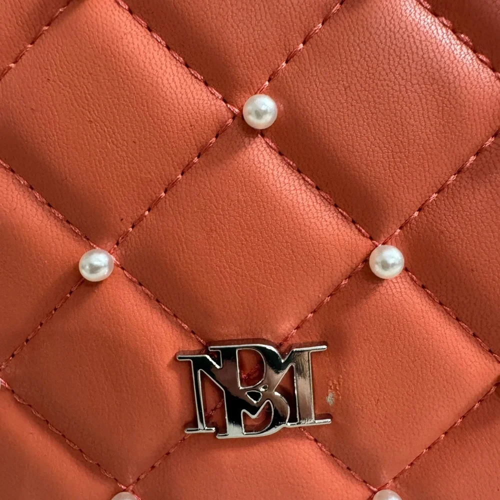 New Badgley Mischka Peach Quilted Crossbody Bag. Small defect see last pic.